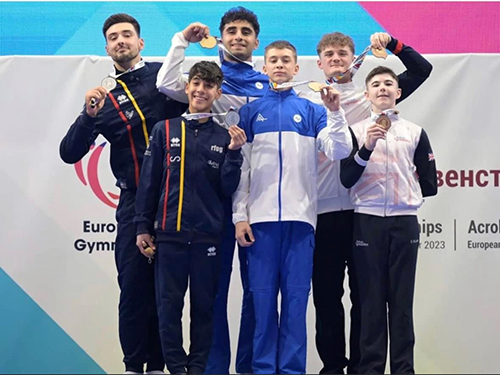 Jake (bottom right) Collecting his Bronze Medal at the Europan Championships 2023